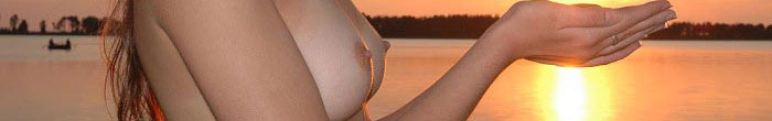 Nude breasts at sunset